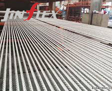 What is the structure of a steel cord conveyor belt?