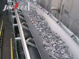 What is the role of flame-retardant conveyor belts in the metallurgical industry?